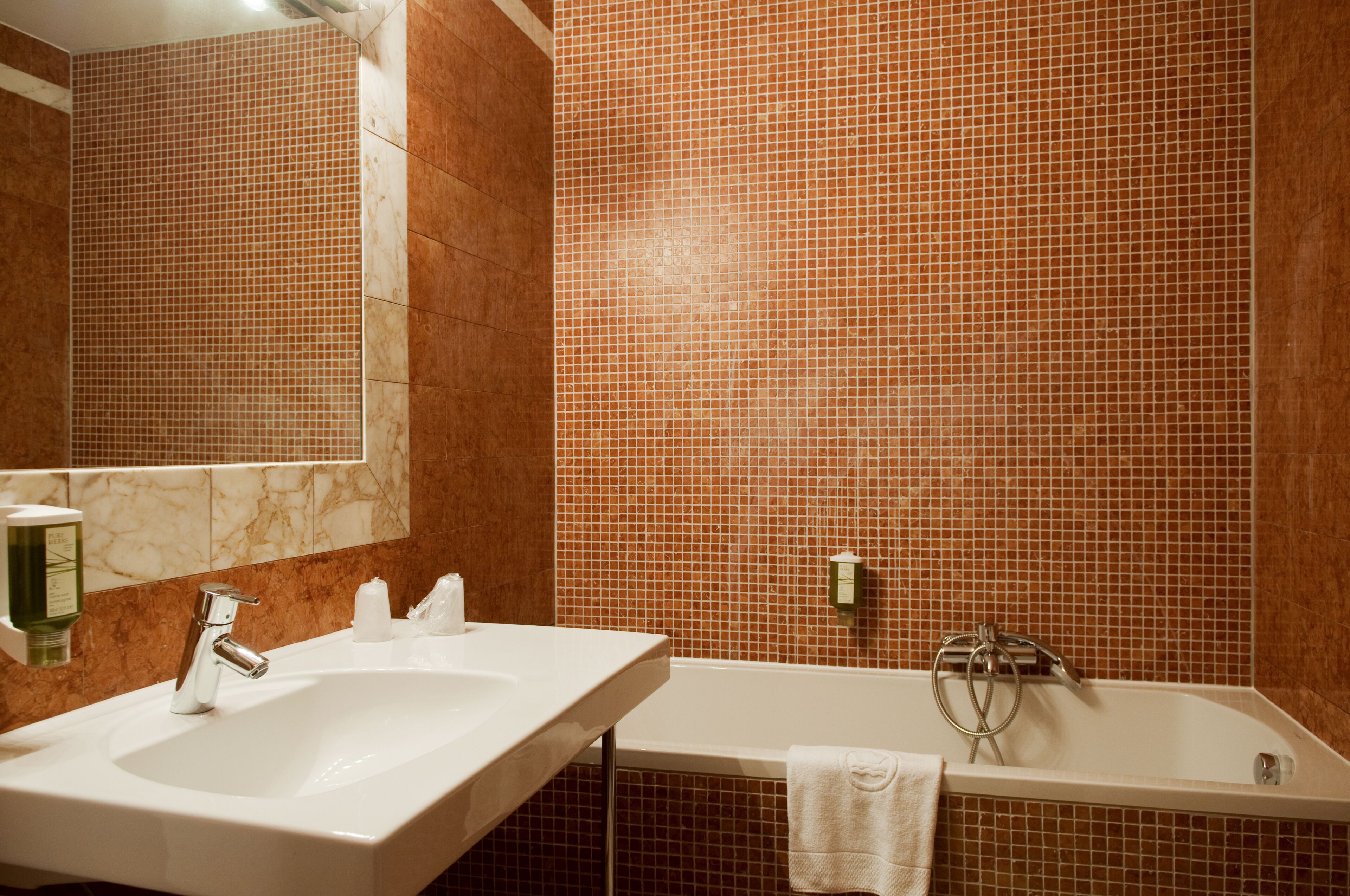 superior double room | bathroom | free toiletries, hair dryer, towels