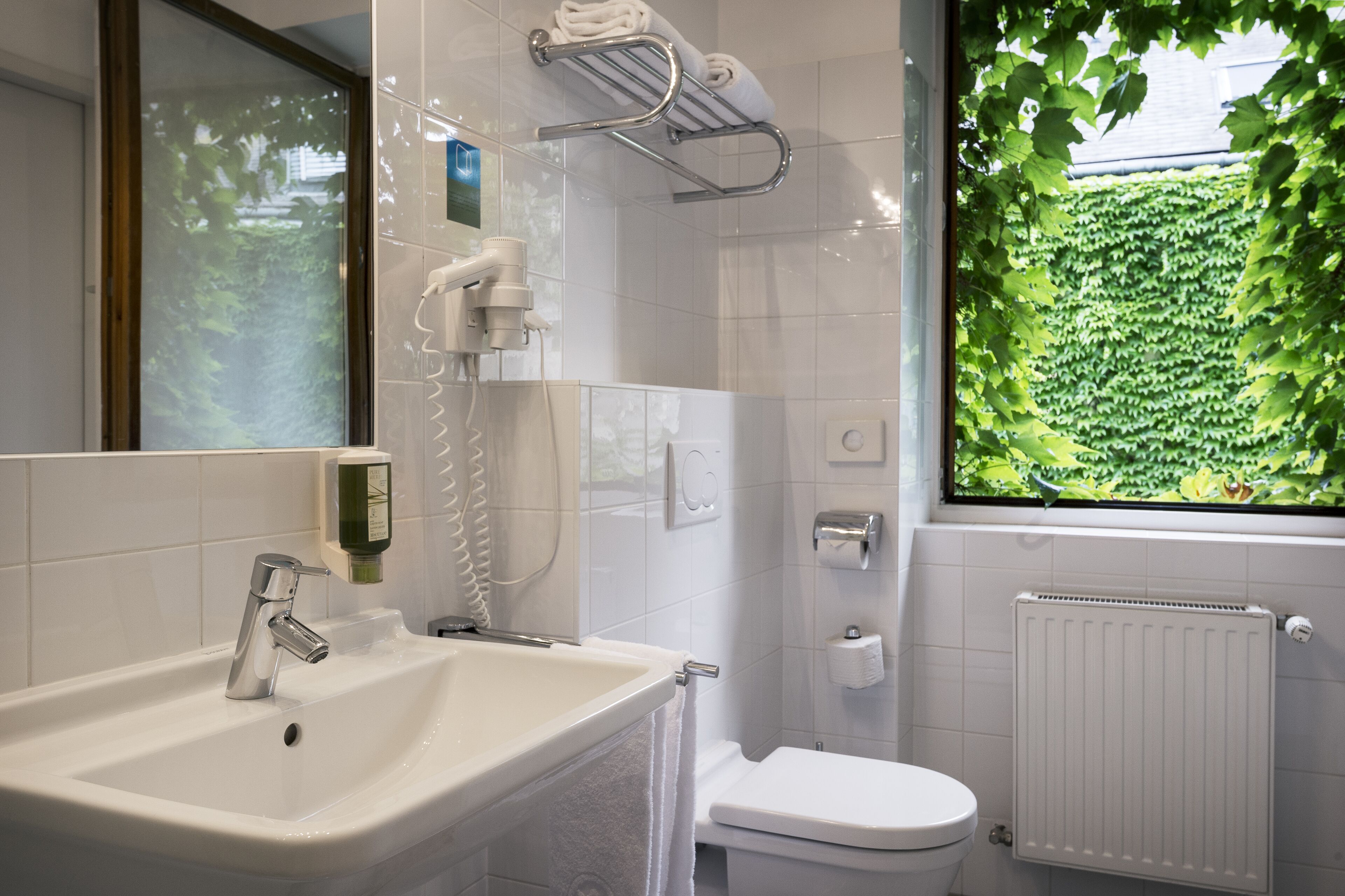 superior double room | bathroom | free toiletries, hair dryer, towels