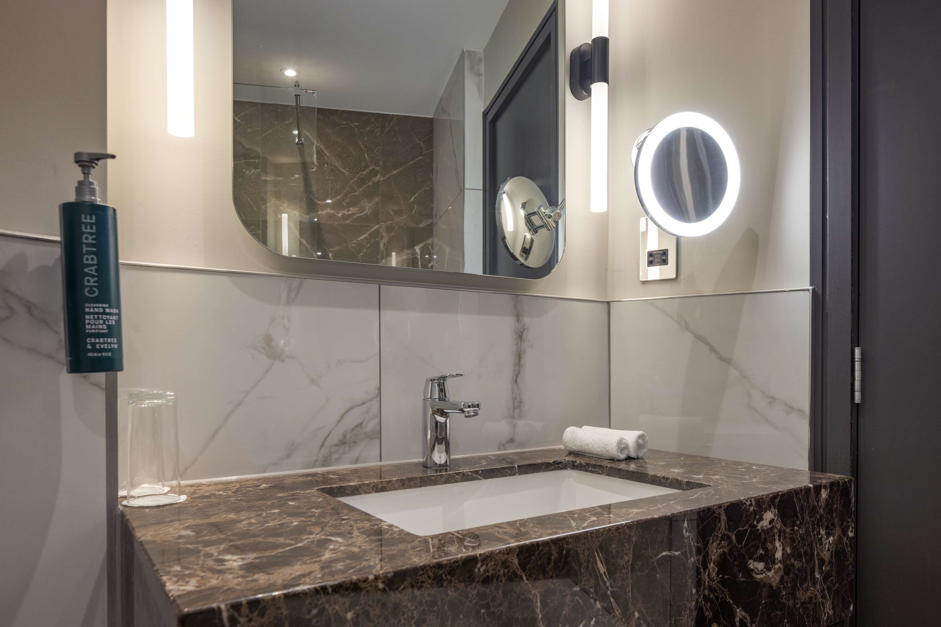 executive suite, 1 king bed | bathroom | free toiletries, hair dryer, towels