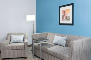 King Study w/sofabed nosmk | Living area | Flat-screen TV - Hampton Inn Charlotte-Uptown (Charlotte)