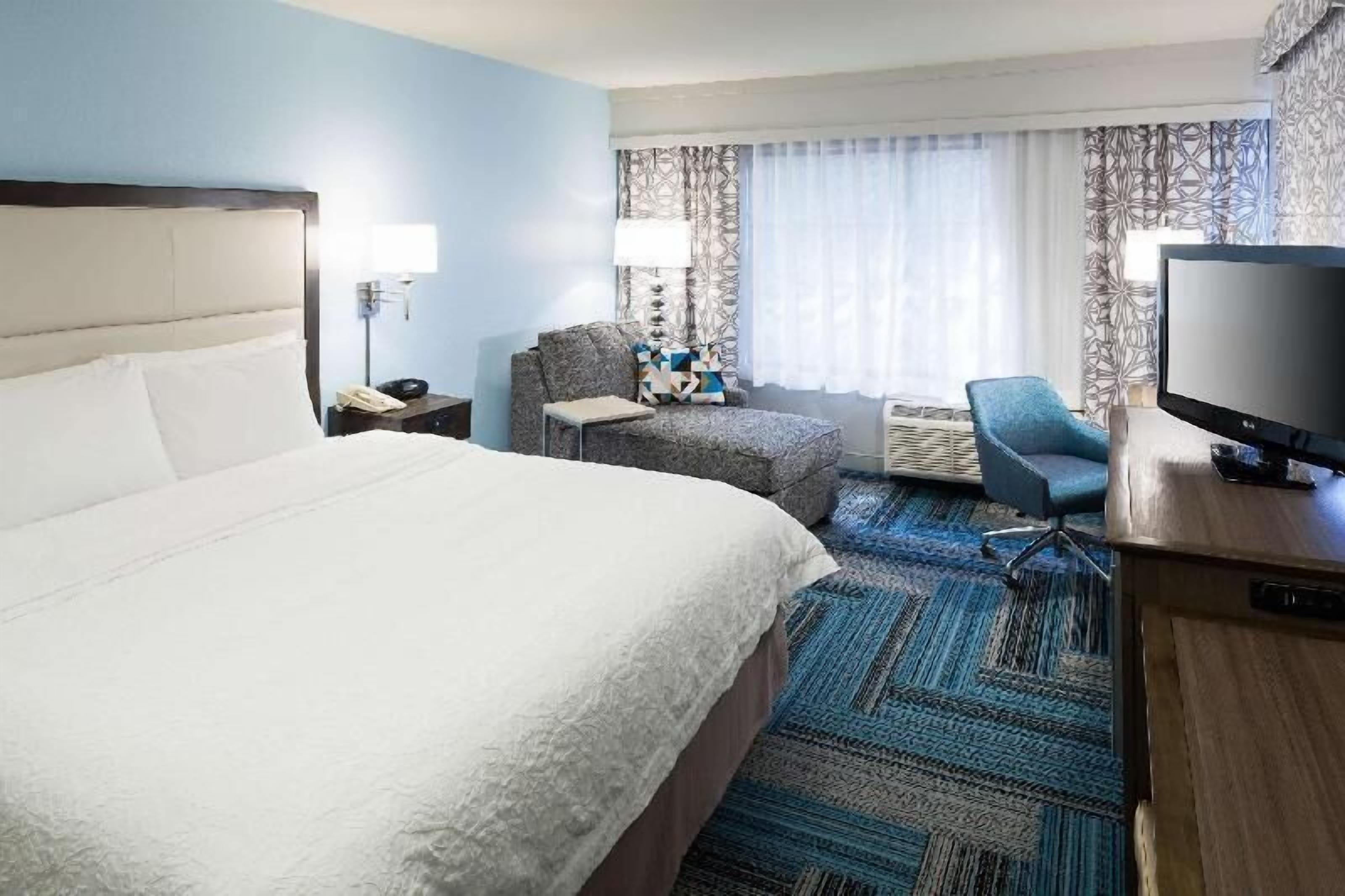 Premium bedding, pillow-top beds, desk, laptop workspace