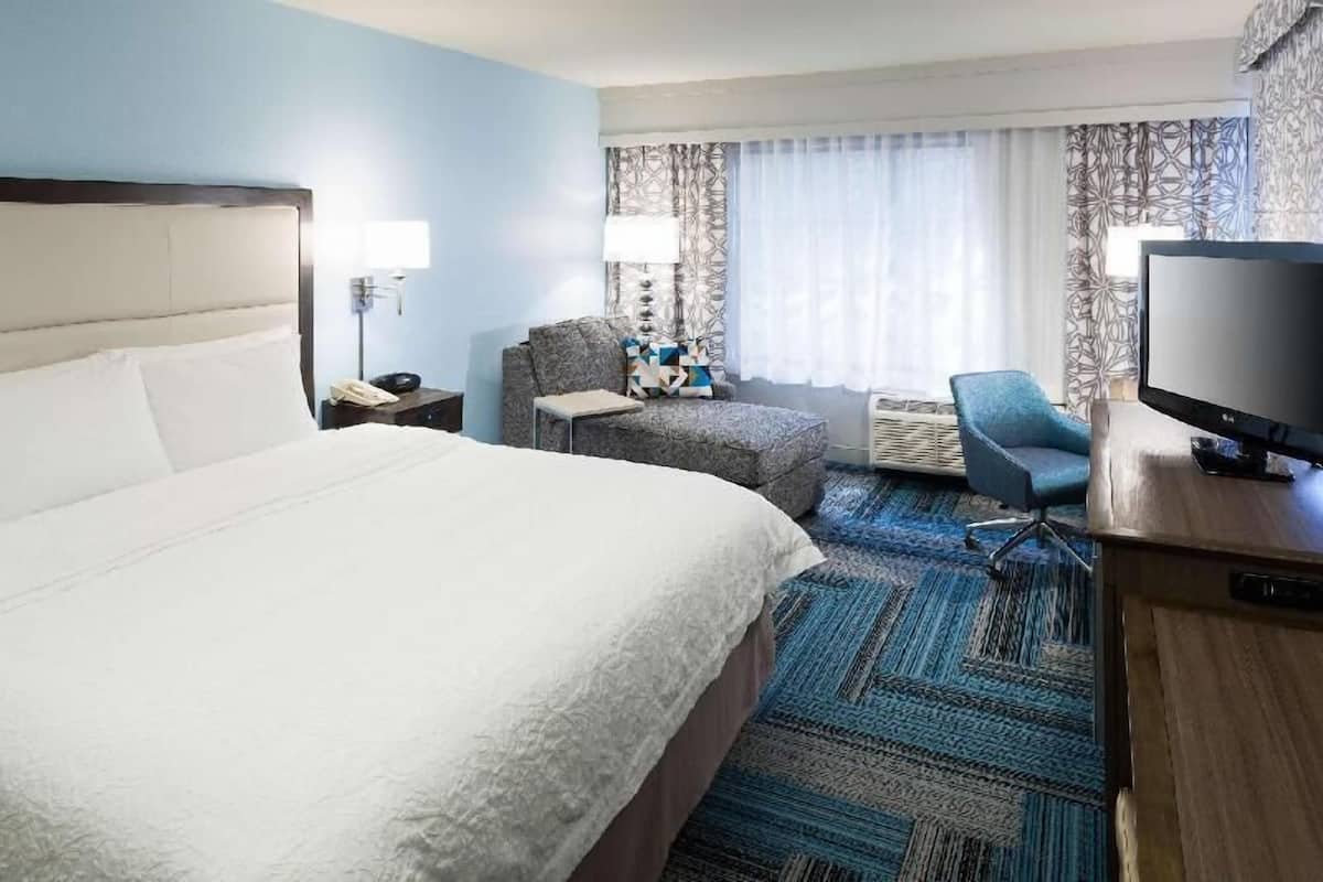 Premium bedding, pillow-top beds, desk, laptop workspace