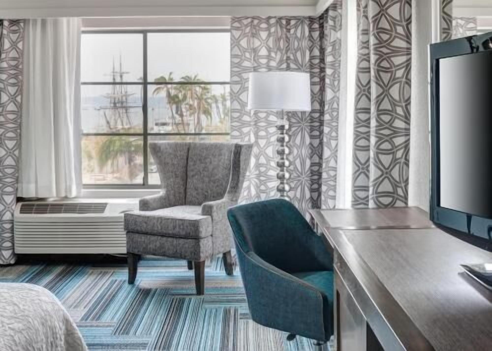 Premium bedding, pillow-top beds, desk, laptop workspace
