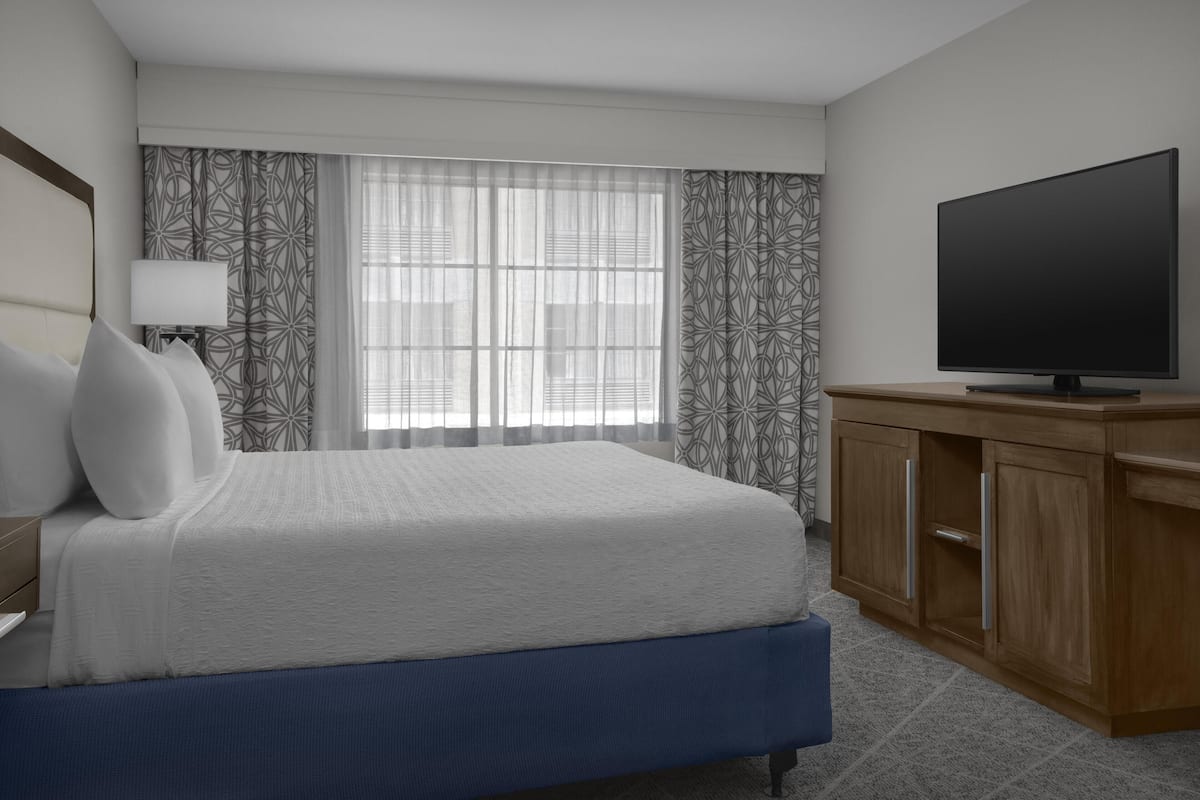 Premium bedding, pillowtop beds, desk, laptop workspace