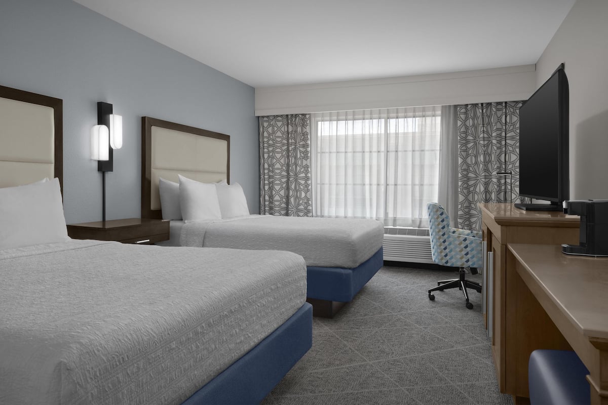 Premium bedding, pillowtop beds, desk, laptop workspace