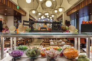 3 restaurants, breakfast, lunch, dinner served; international cuisine