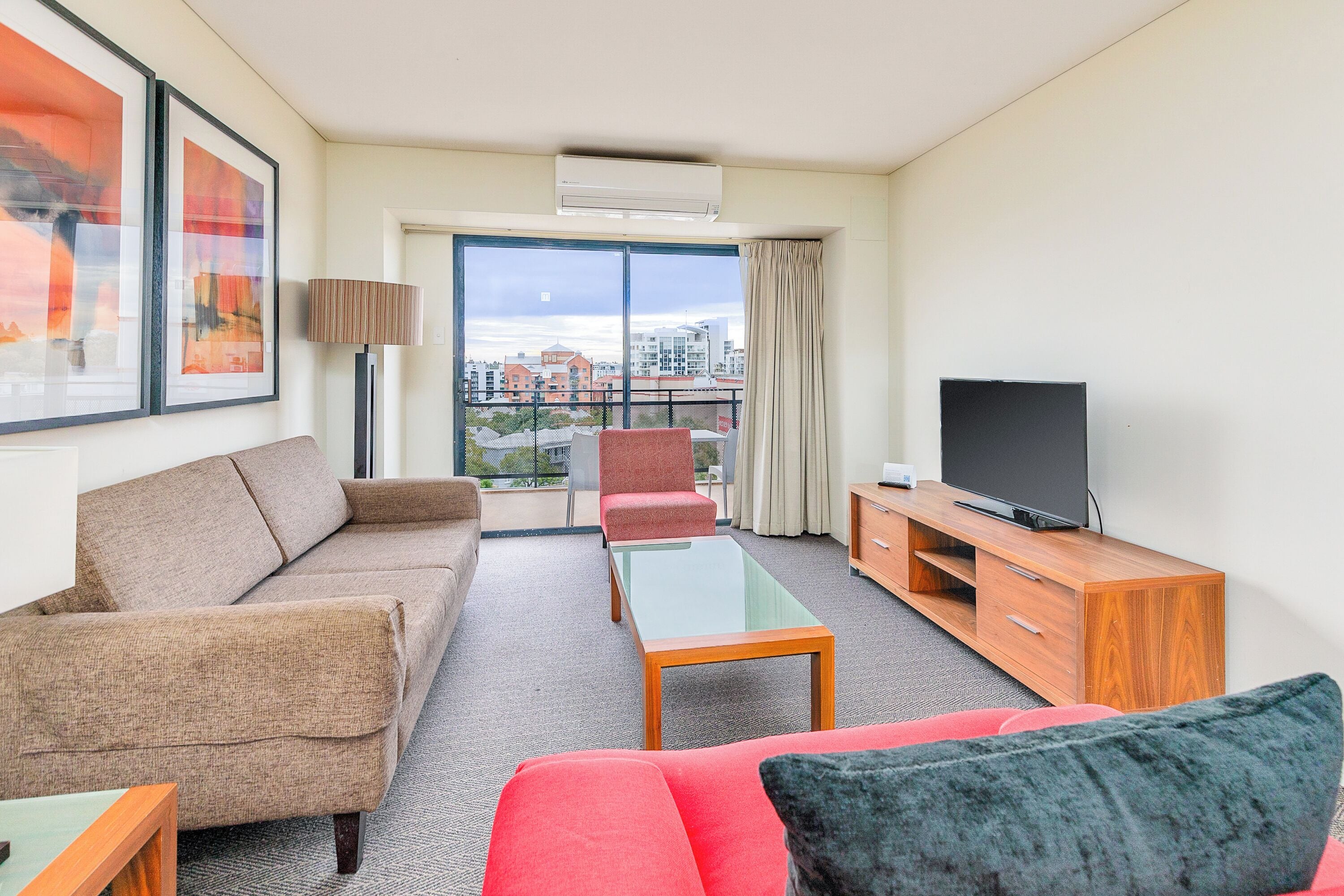 Apartment, 2 Bedrooms, Balcony | Living area | Flat-screen TV