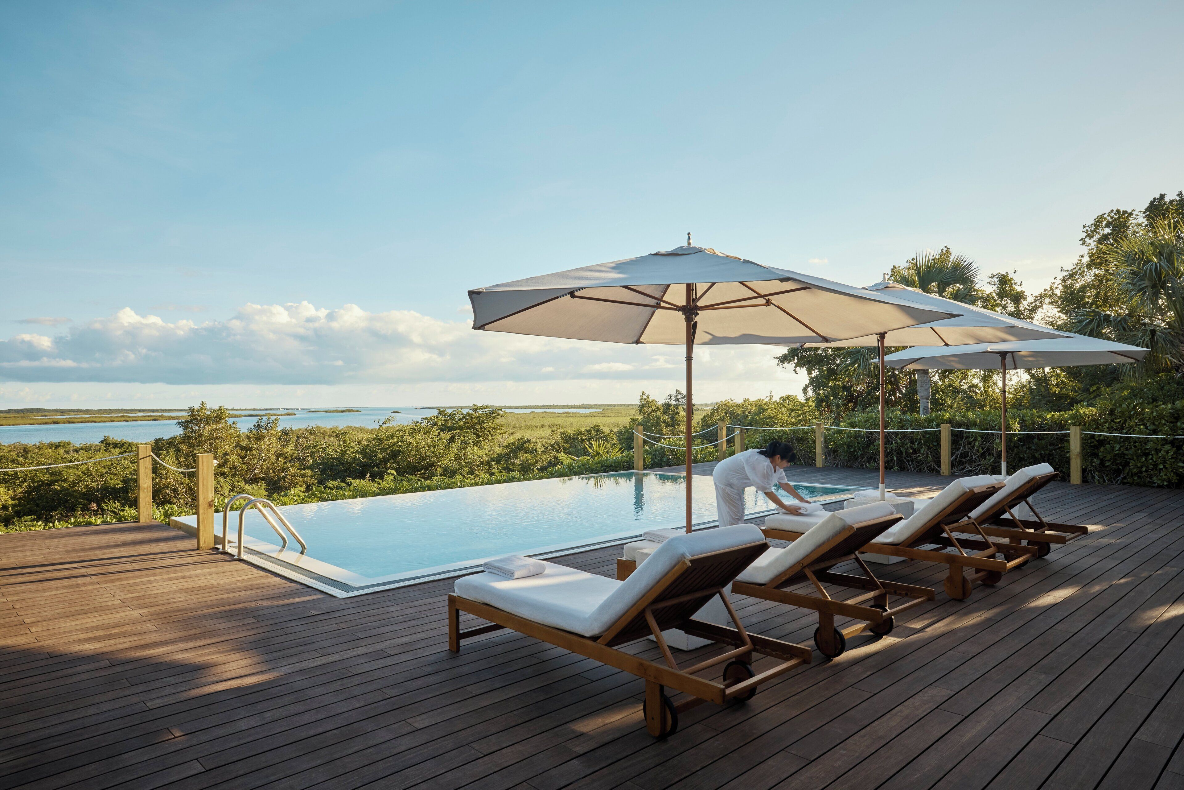 2 outdoor pools, pool umbrellas, sun loungers