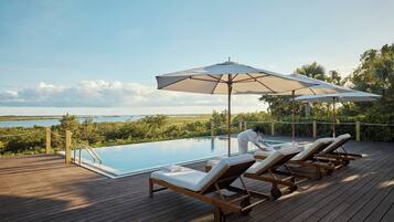 2 outdoor pools, pool umbrellas, sun loungers