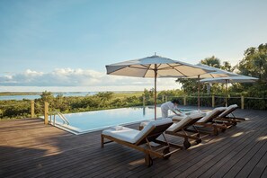 2 outdoor pools, pool umbrellas, pool loungers