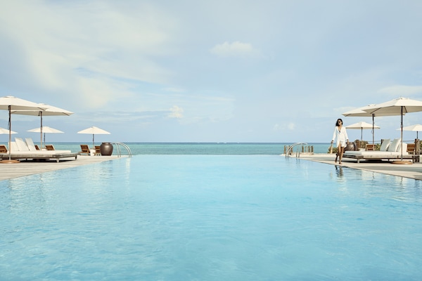 2 outdoor pools, pool umbrellas, pool loungers