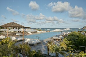 2 outdoor pools, pool umbrellas, sun loungers