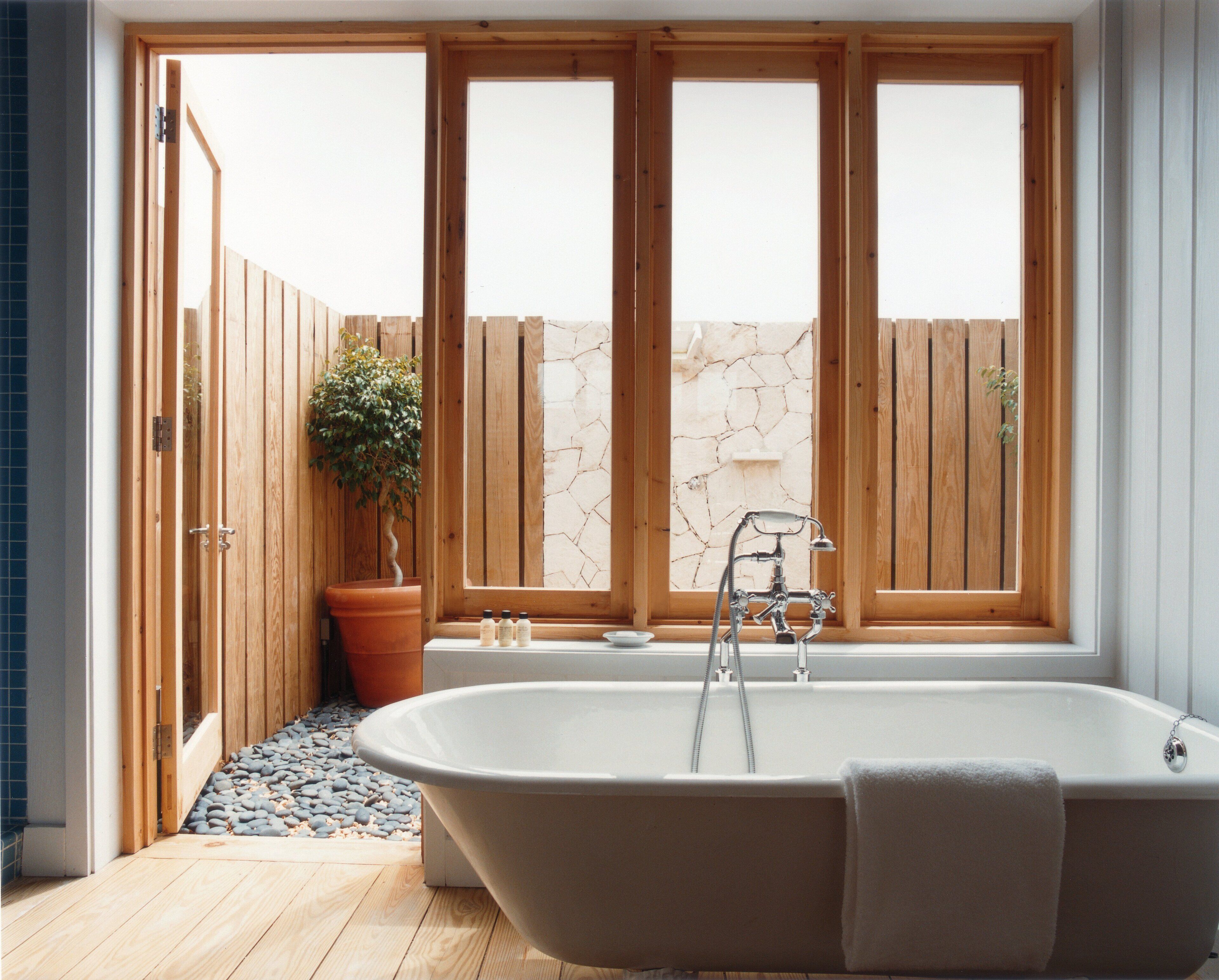 designer toiletries, hair dryer, bathrobes, slippers