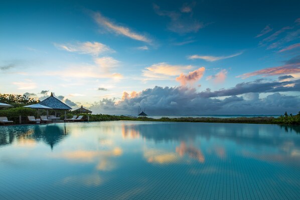 2 outdoor pools, pool umbrellas, pool loungers