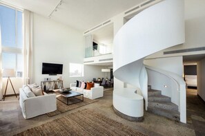 Flat-screen TV, iPod dock, pay movies