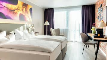 Hypo-allergenic bedding, desk, blackout drapes, soundproofing