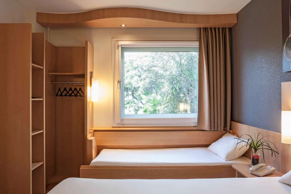 room, multiple beds | desk, blackout curtains, soundproofing, iron/ironing board