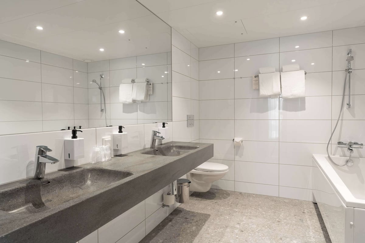 junior suite | bathroom | hair dryer, towels