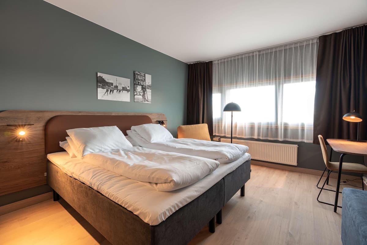 Pillowtop beds, desk, blackout drapes, soundproofing