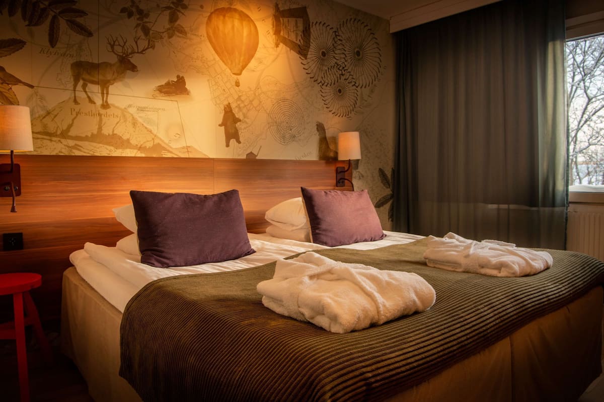 superior room, 1 king bed | desk, blackout curtains, iron/ironing board, free cots/infant beds