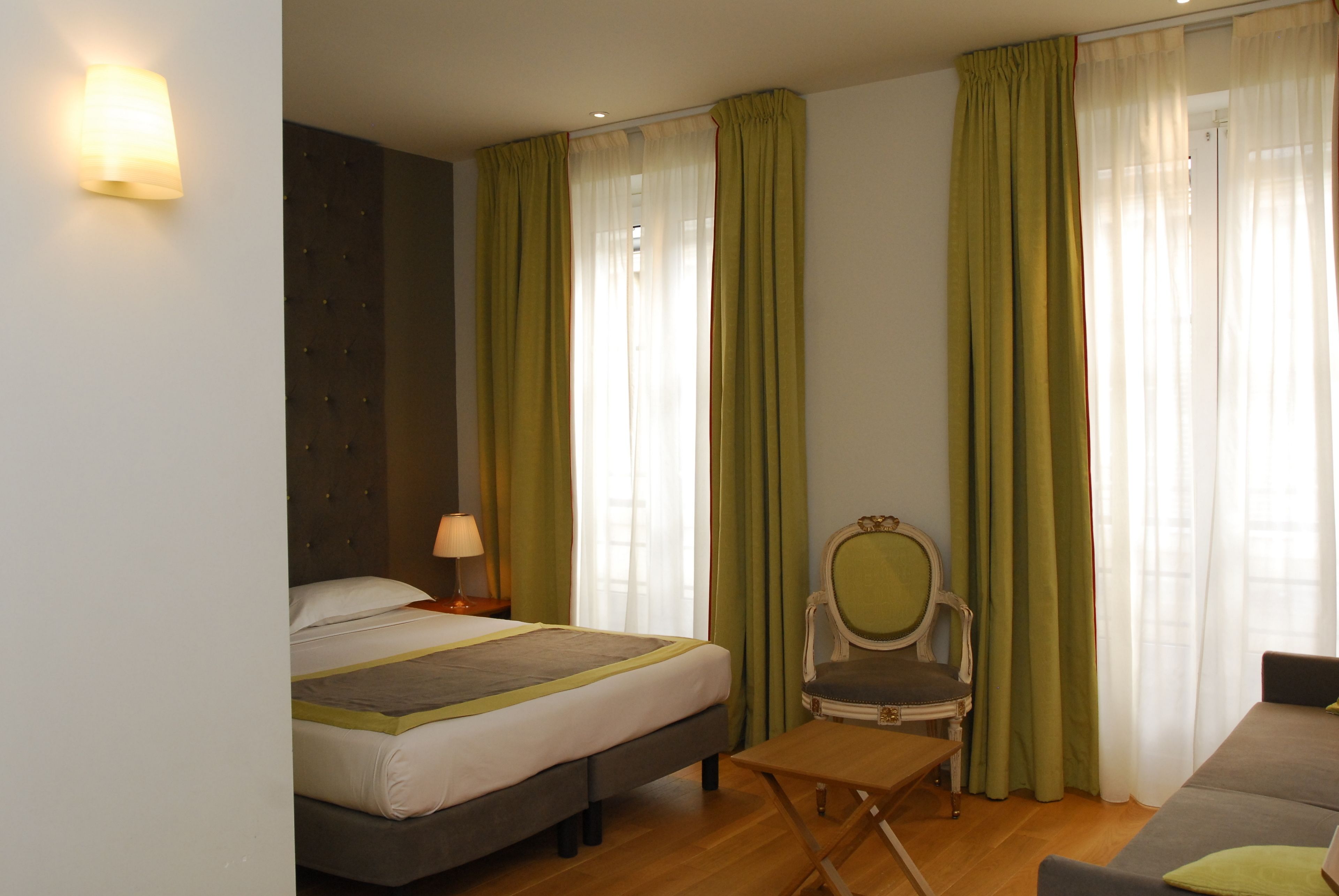 junior quadruple room | minibar, in-room safe, blackout curtains, soundproofing