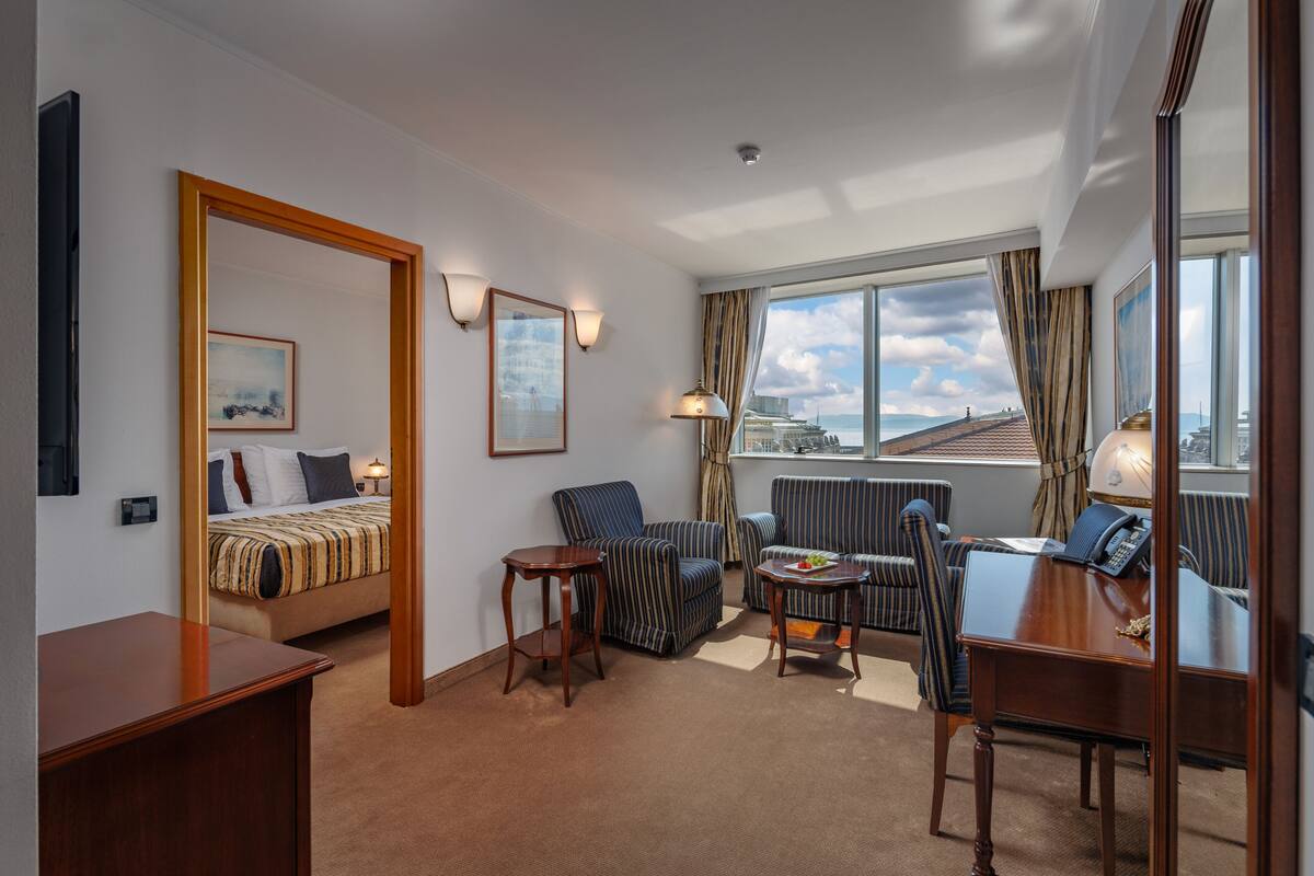 suite | premium bedding, down duvets, minibar, in-room safe