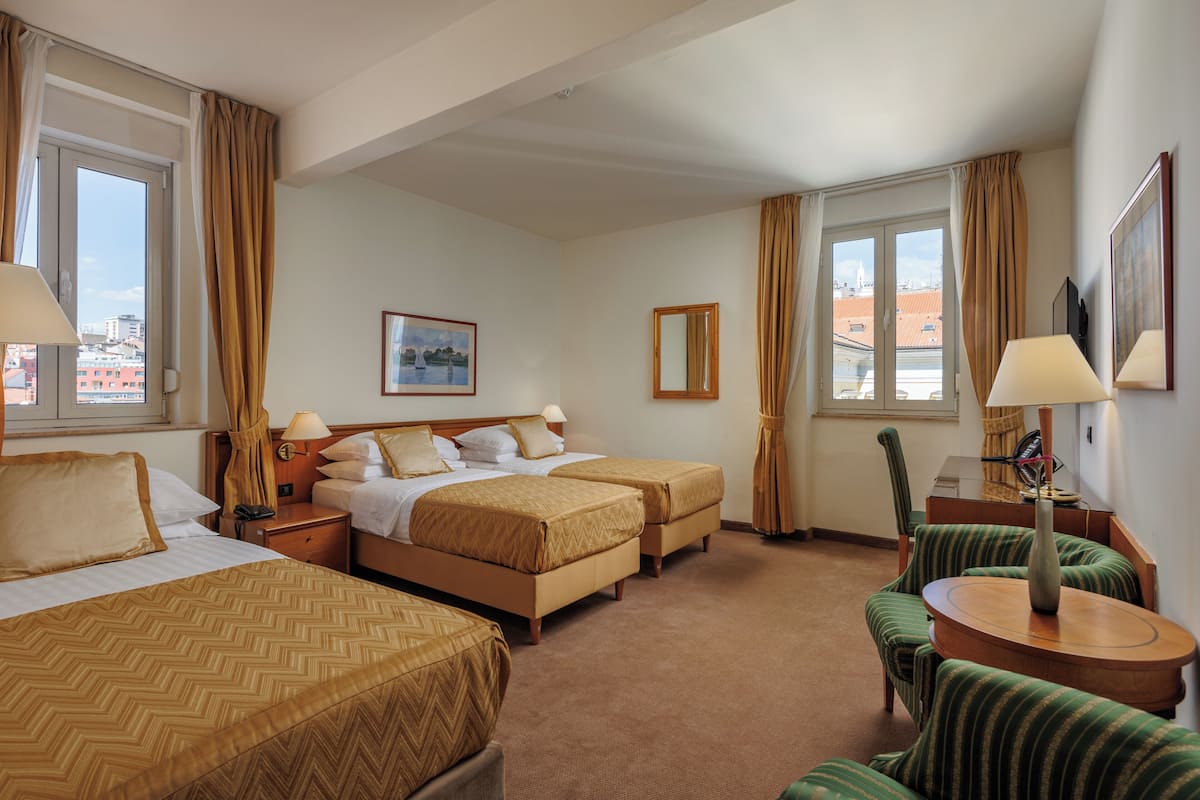 Standard Triple Room | 1 bedroom, premium bedding, down comforters, minibar