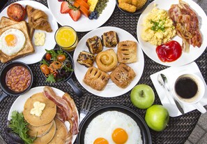 Daily buffet breakfast (SGD 38.02 per person)