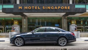 A dark-colored sedan parked in front of the M Hotel Singapore. - M Hotel Singapore City Centre (Singapore)