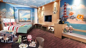 A children's room with a nautical theme, including a bed, desk, and play area with toys and a TV. - M Hotel Singapore City Centre (Singapore)