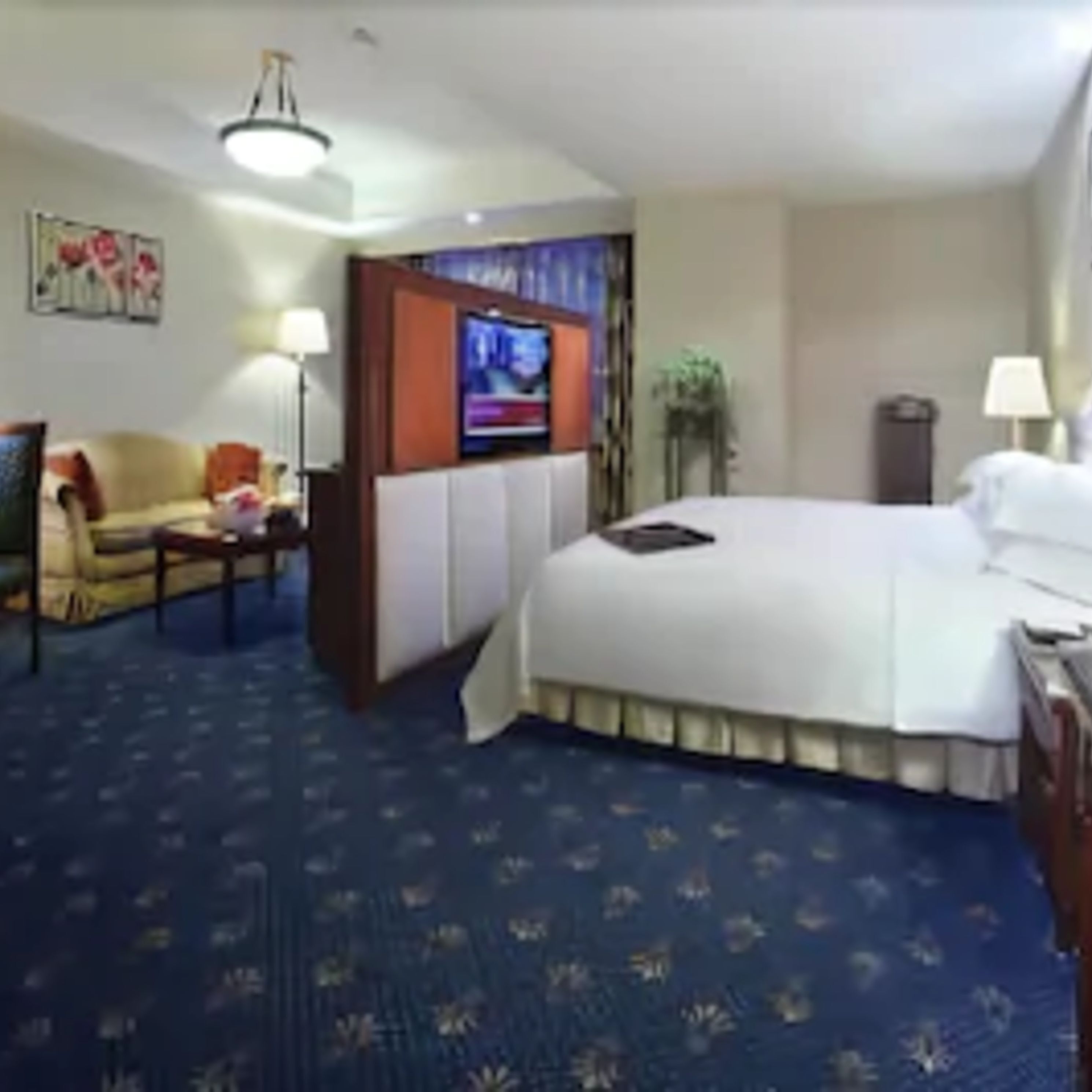 business suite  | in-room safe, desk, soundproofing, iron/ironing board
