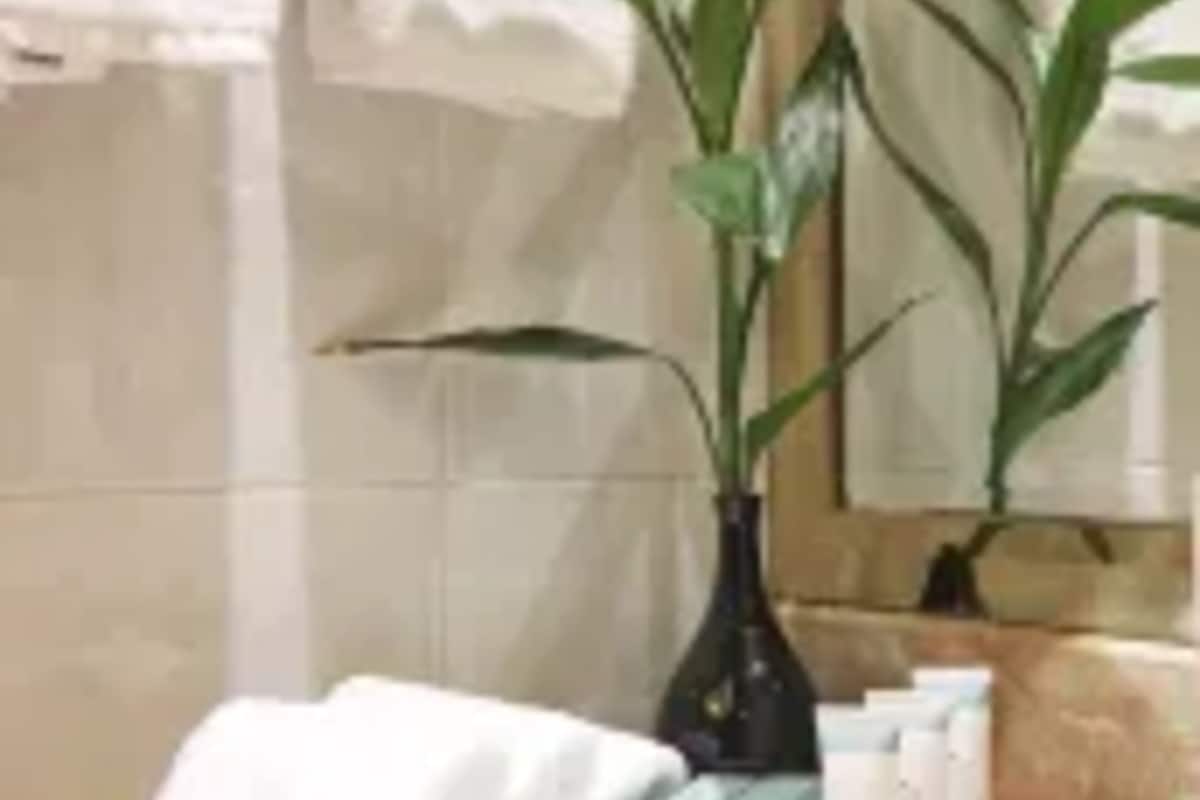 hair dryer, slippers, towels, soap