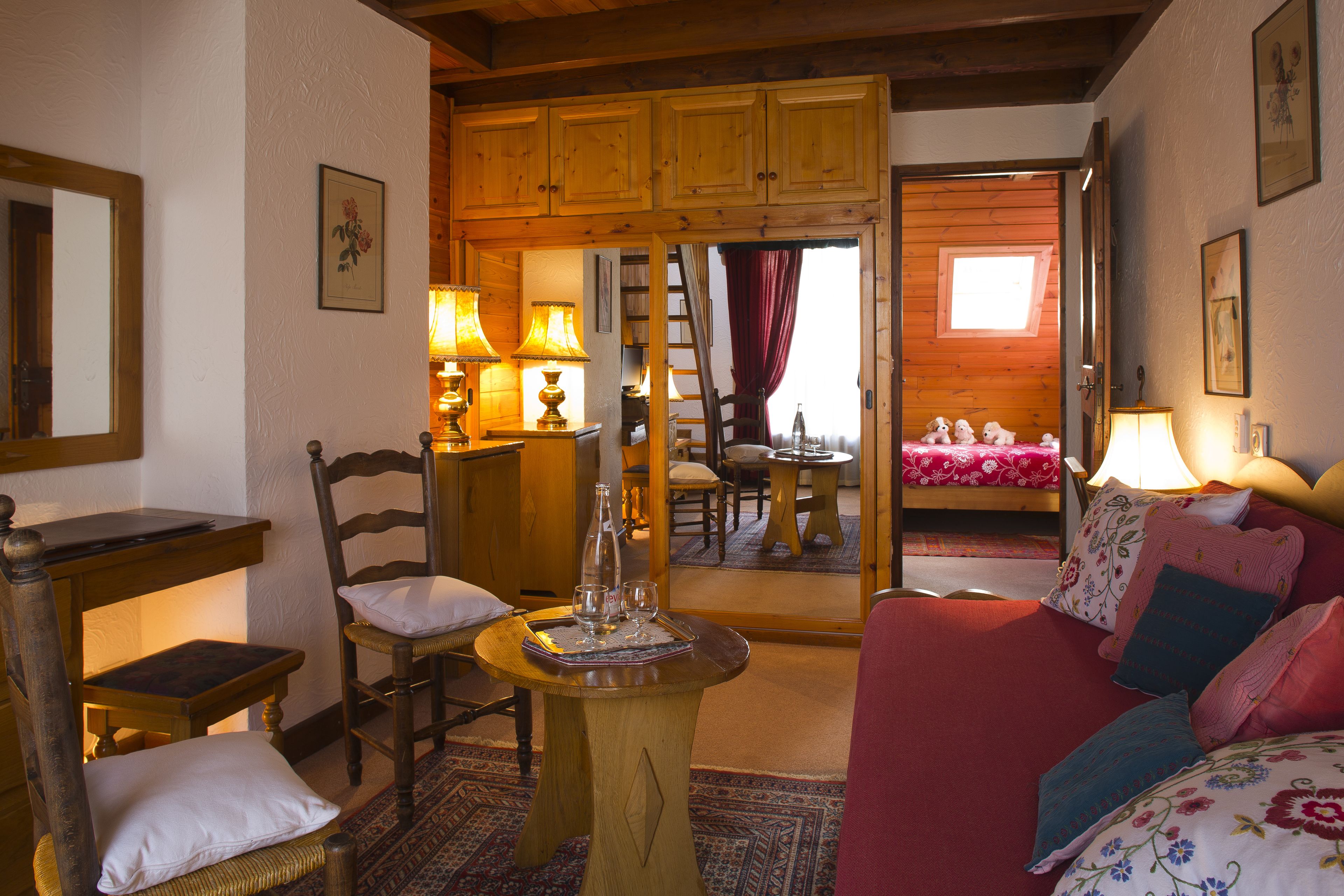 mini suite duplex, mountain corner, quadruple, 3rd floor, south, balcony, garden view | living area | flat-screen tv, dvd player