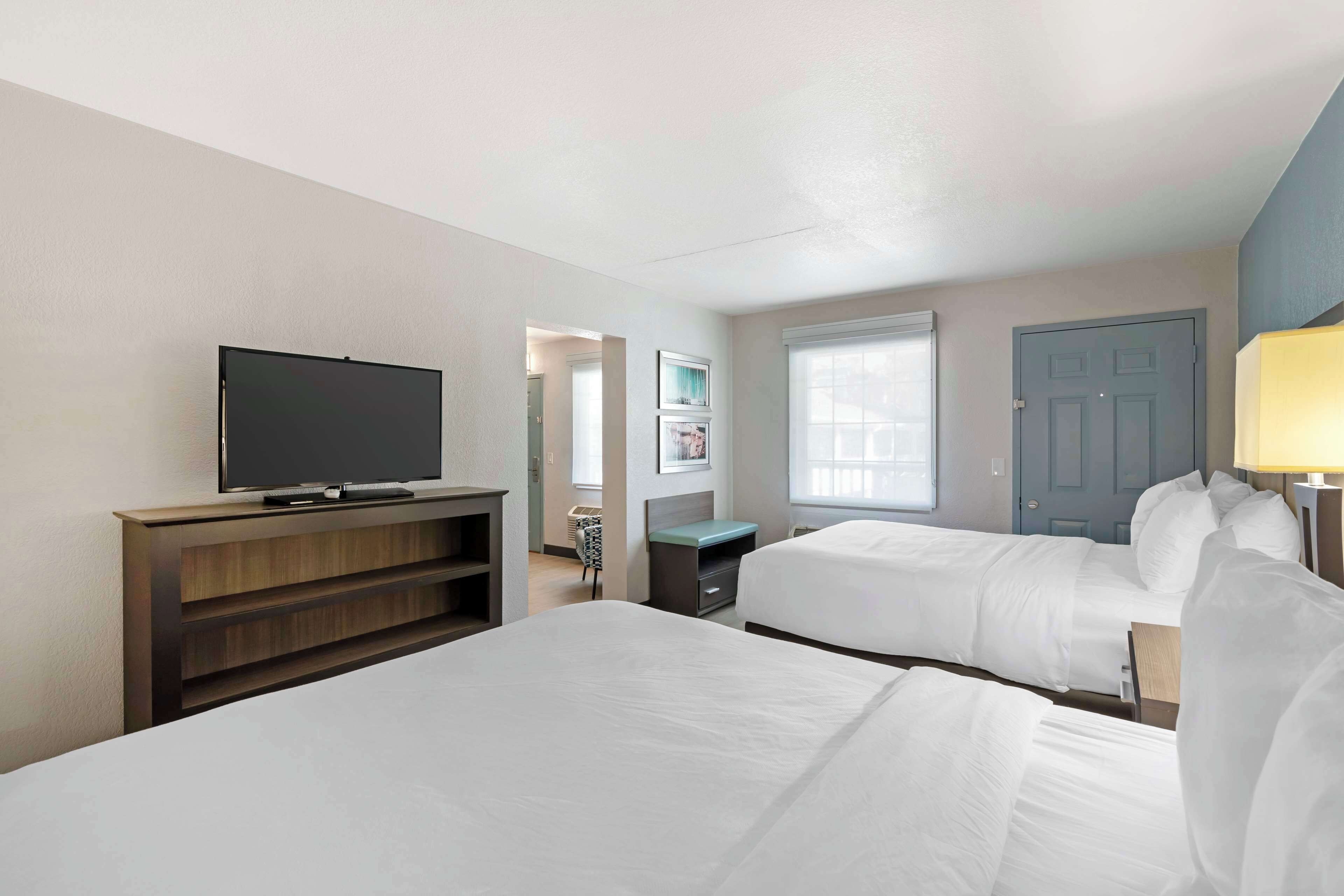 suite, 2 queen beds, non smoking, refrigerator | pillow-top beds, individually furnished, desk, laptop workspace