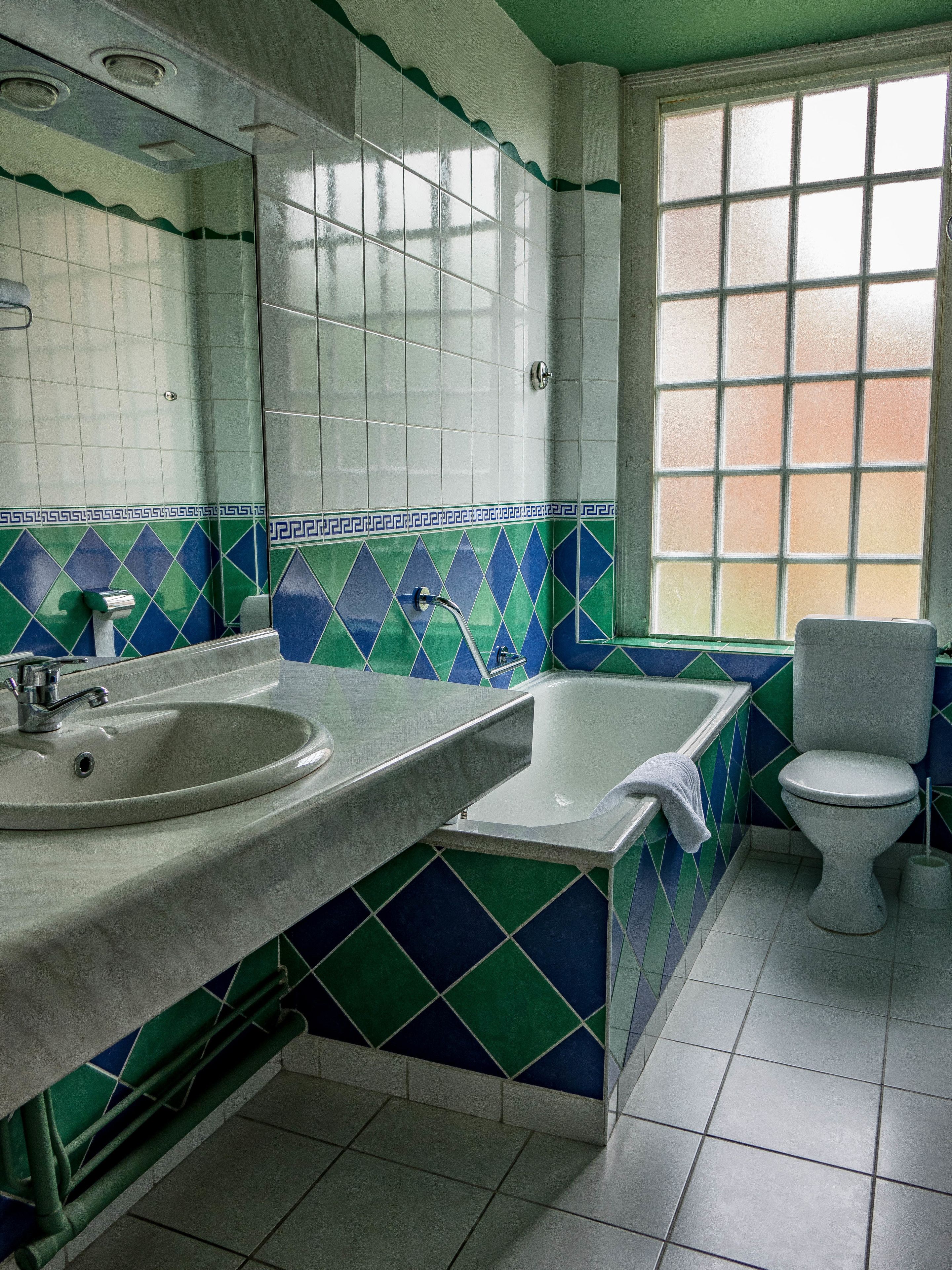 superior double room | bathroom | free toiletries, hair dryer, towels