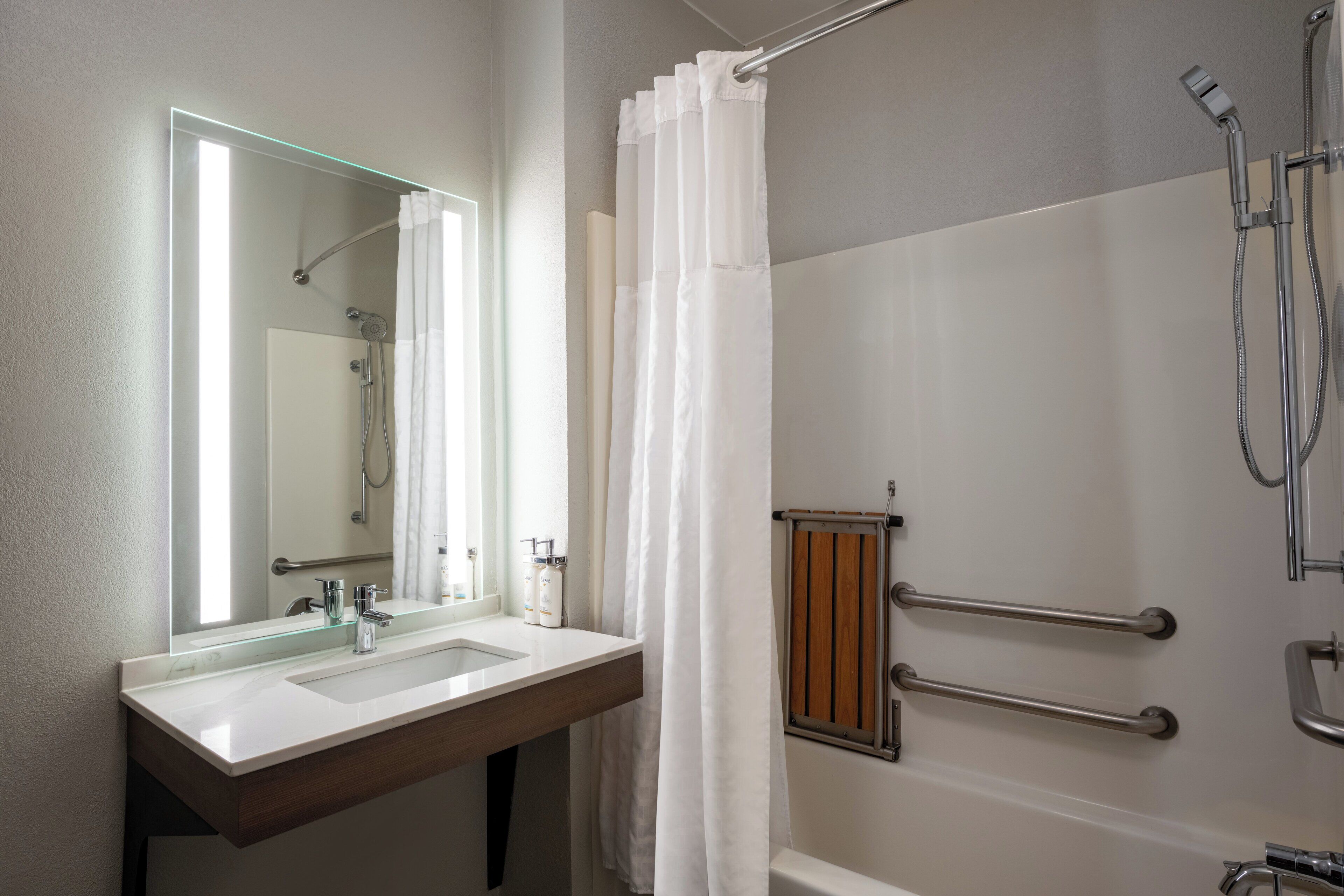 accessible queen studio suite with full kitchen | bathroom | free toiletries, hair dryer, towels