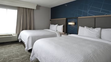 Suite, Multiple Beds | Premium bedding, desk, laptop workspace, blackout drapes