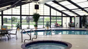 Indoor pool, open 6 AM to 11 PM, pool loungers