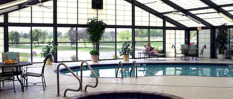 Indoor pool, open 6 AM to 11 PM, pool loungers