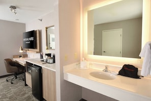 Premium bedding, desk, laptop workspace, blackout curtains