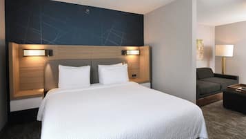 Premium bedding, desk, laptop workspace, blackout curtains