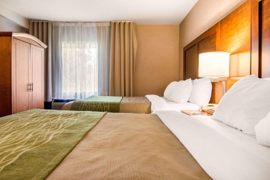 Premium bedding, desk, blackout drapes, iron/ironing board