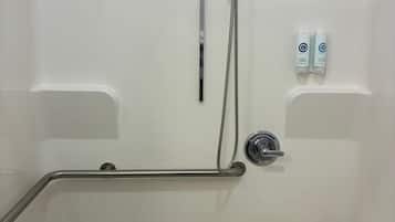 Combined shower/bathtub, hair dryer, towels