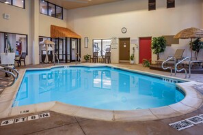 Indoor pool, open 8:00 AM to 10:00 PM, pool loungers