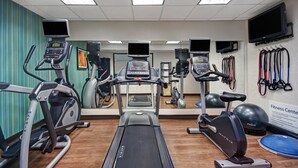 A fitness center with treadmills, elliptical machines, and exercise balls. - Holiday Inn Express Marshall by IHG (Marshall)