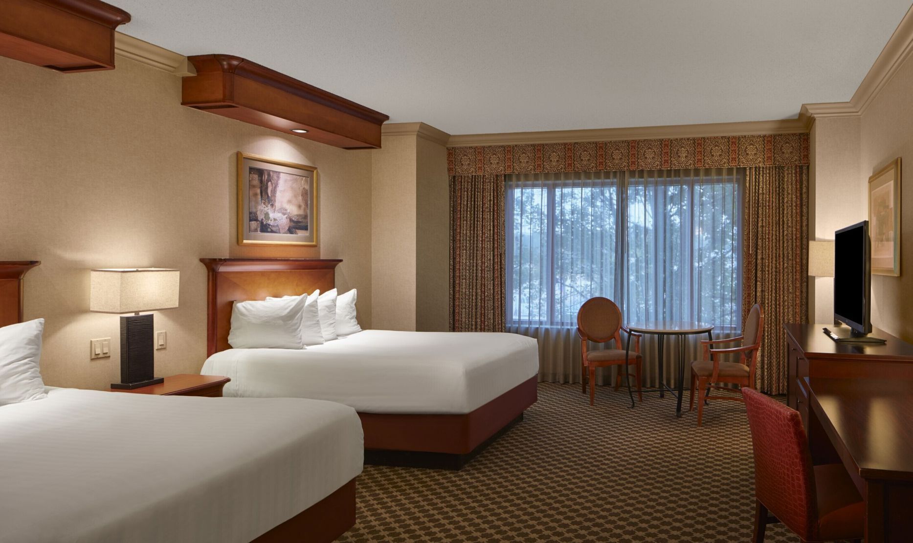 Premium bedding, down duvets, pillow-top beds, in-room safe