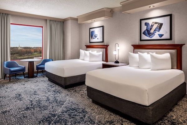 Premium bedding, down comforters, pillowtop beds, in-room safe