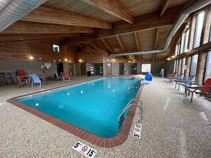 Indoor pool, open 7:00 AM to midnight, pool loungers