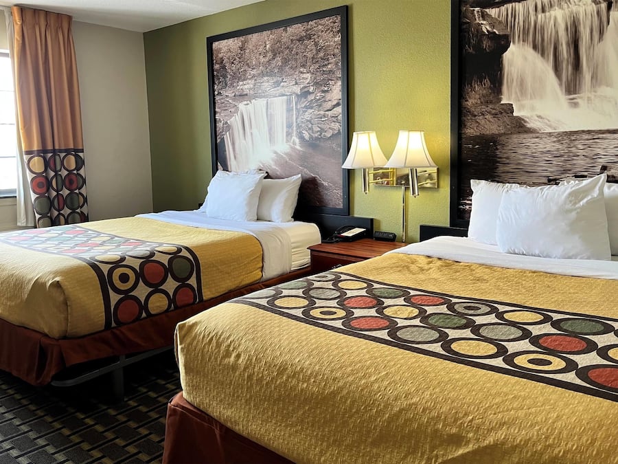 Desk, laptop workspace, blackout drapes, iron/ironing board