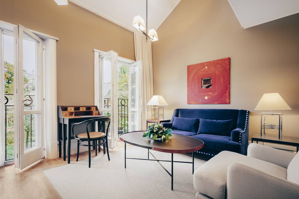 Suite junior (Split Level) | Minibar, caja fuerte, escritorio y espacio para trabajar con un portátil